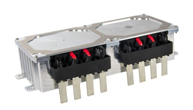 Transformer with integrated resonant inductor 2x11kW for automotive water-cooled systems
